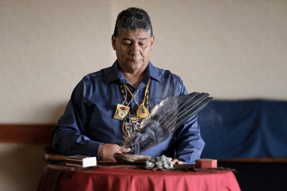 Elder FRank Beaulieu conducting smudging ceremony at CCMEC 2025